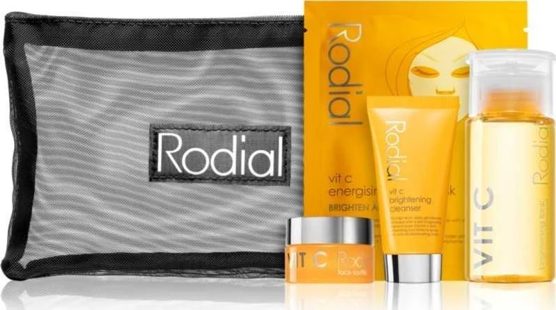 „Little Luxuries“ rinkinys „Rodial“: skaistinamasis veido gelis su vitaminu C, 20 ml + skaistinamoji pudra su vitaminu C, 15 ml + skaistinamasis tonikas su vitaminu C, 100 ml + energizuojanti veido kaukė su vitaminu C, 20 g