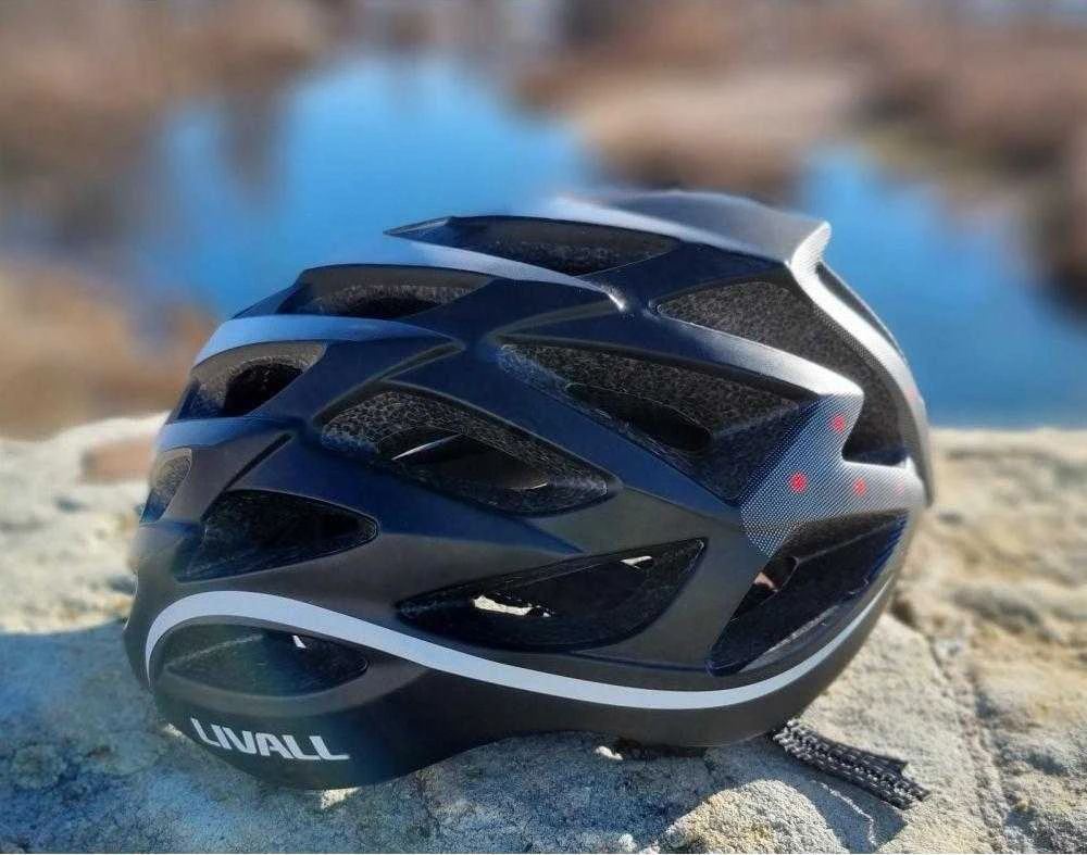 Livall Plento šalmas su „Bluetooth“ ryšiu, 55–61 cm, LED/SOS/interkomu, baltas