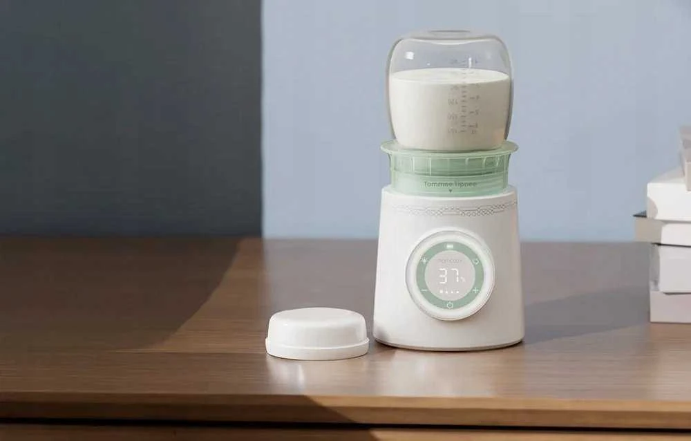 MOMCOZY ĮKRAUNAMAS KELIONINIS BUTELIUKŲ ŠILDYTUVAS