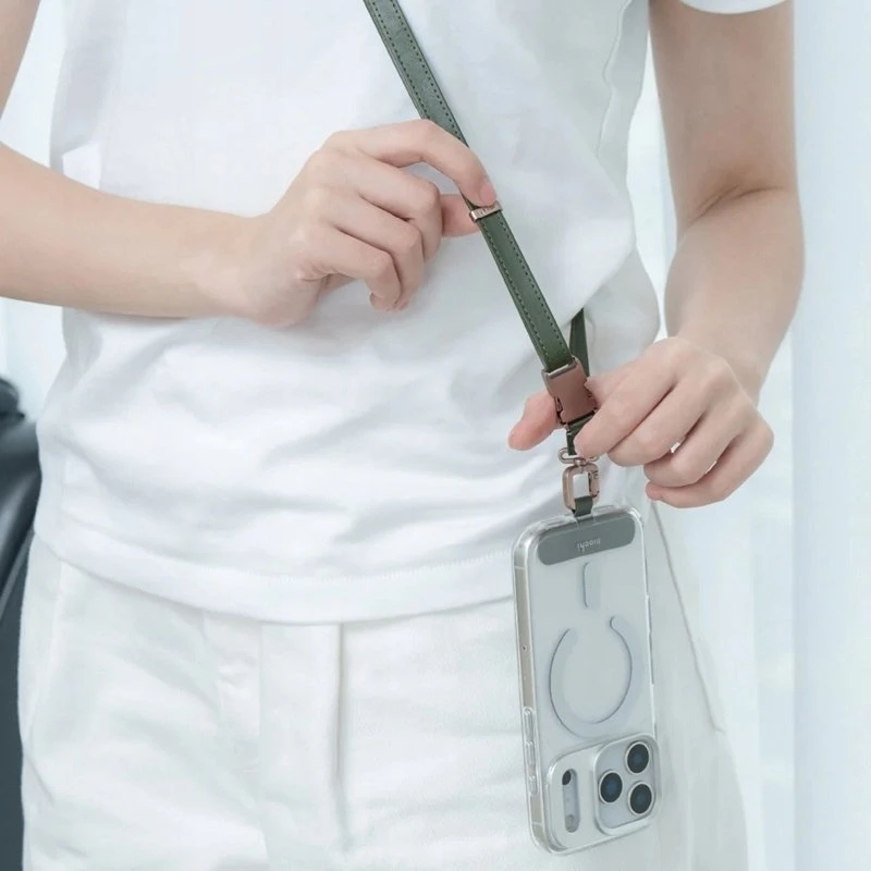 Dėklas Moshi 2-in-1 riešo ir kūno dirželis su adapteriu - ekologiškos odos telefono pakabukas samanų žalias