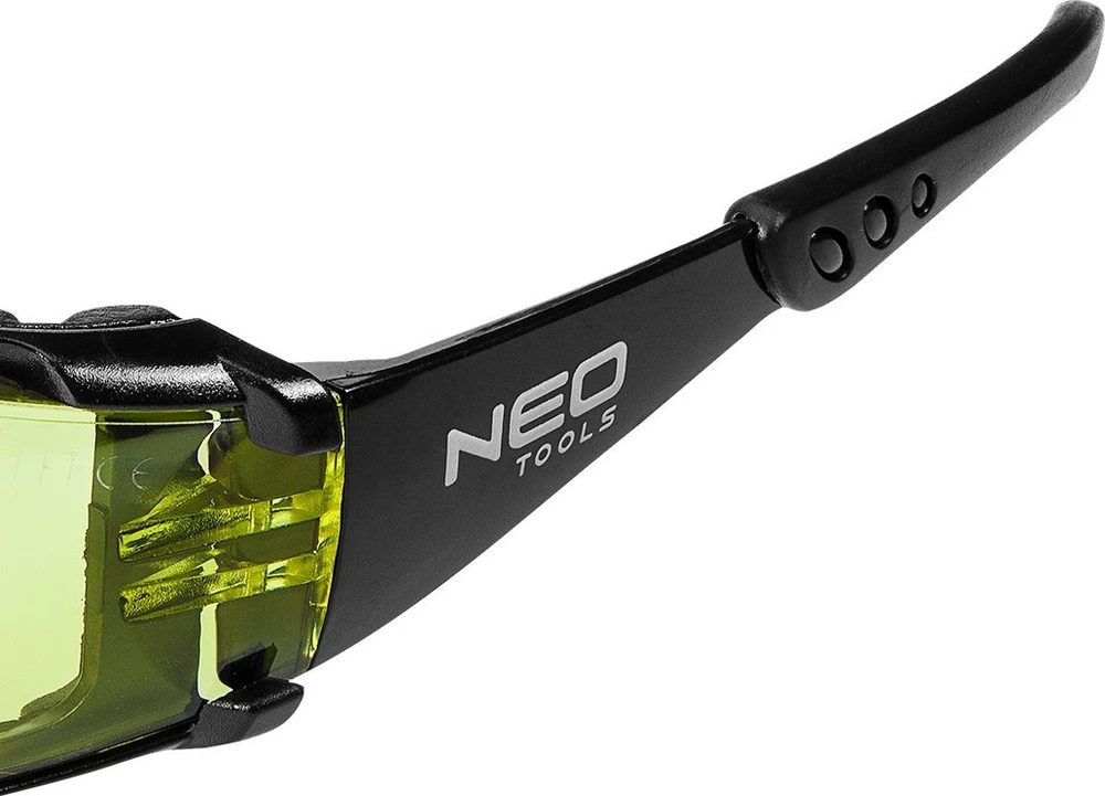 Apsauginiai akiniai NEO 97-521 su putplasčio įdėklu, geltoni lęšiai, FT klasė
