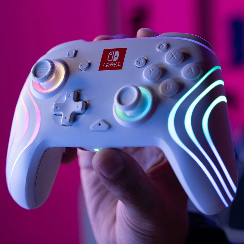 PDP Nintendo Switch baltas belaidis valdiklis (Afterglow Wave)
