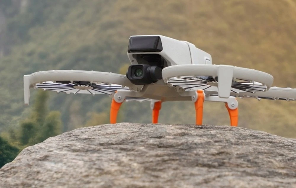 „Sunnylife“ važiuoklės atnaujinimas, skirtas „DJI Flip“ (oranžinis)