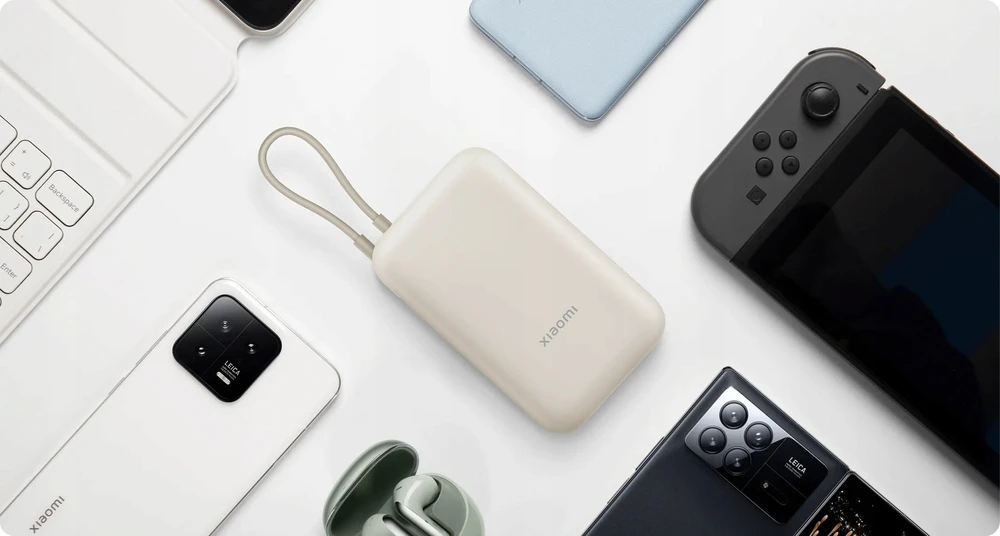 Išorinė baterija Xiaomi Power Bank 10000mAh (su integruotu kabeliu), kreminės spalvos
