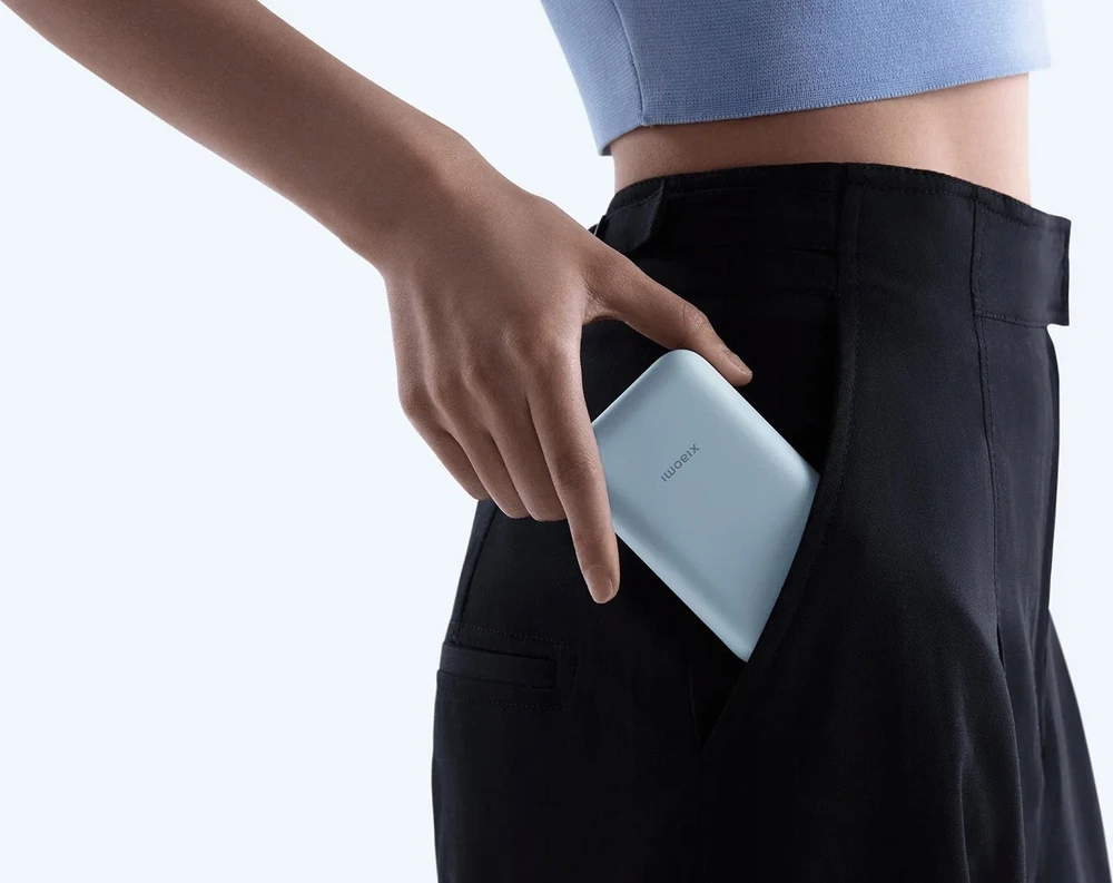 Išorinė baterija Xiaomi Power Bank 10000mAh (su integruotu kabeliu), kreminės spalvos