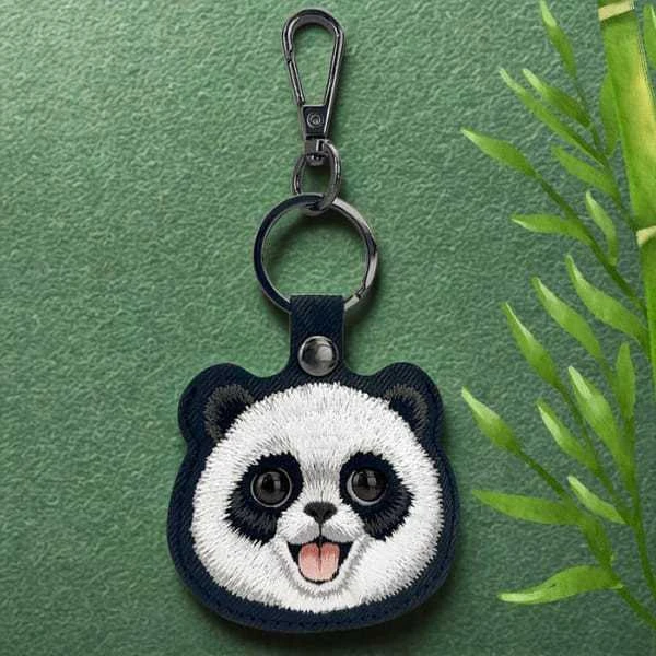 Dėklas daiktų ieškikliui Nimmy New Big Eyed Pet 2.0 Panda juodos spalvos