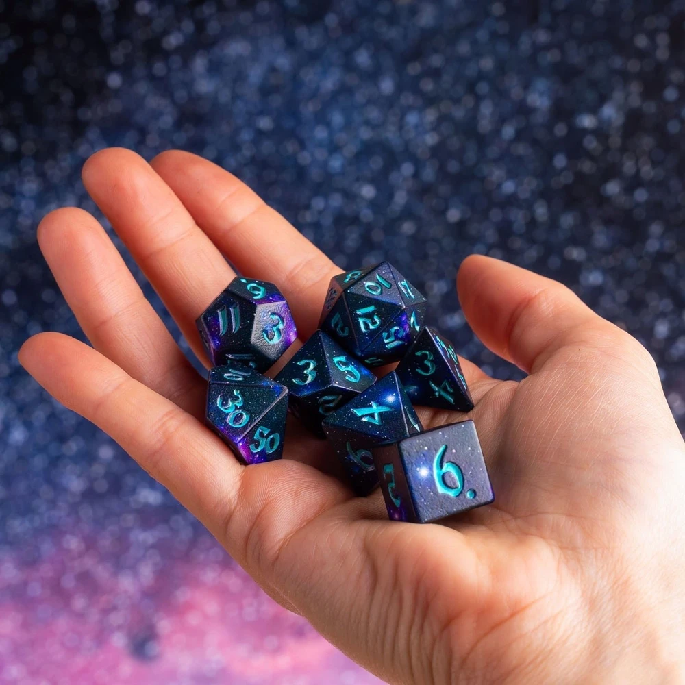 Q-Workshop Stardust Full Art stalo RPG kauliukai, 7 vnt., kosminiai