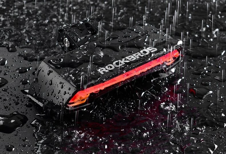„RockBros“ galinis dviračio žibintas su lazeriniu nuotolinio valdymo pultu ir USB-A posūkio signalo funkcija