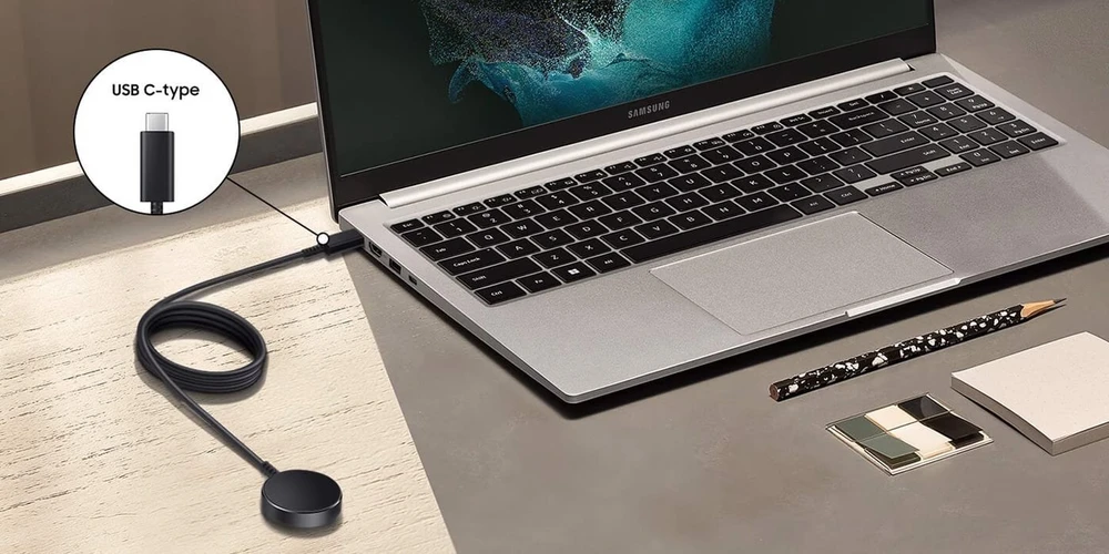112803 EP-OL300BBE Samsung belaidis įkroviklis skirtas Samsung Galaxy Watch 5/6/7/Ultra juodos spalvos