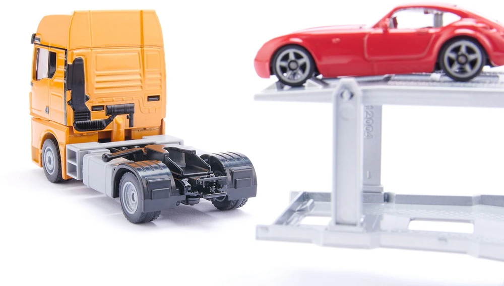 Siku Žaislinis MAN vilkikas su 2 automobiliais