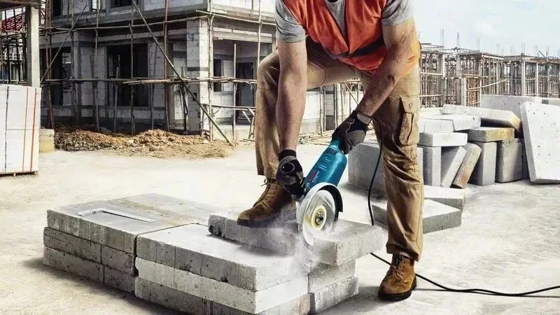 BOSCH kampinis šlifuoklis 180mm/2200W GWS 2200-180 WŁĄCZNIK ŁOPATKOWY