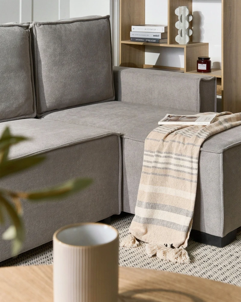 Beliani Išskleidžiama 3 vietų kampinė sofa EDANE, pilka, su patalynės dėže, kairinė