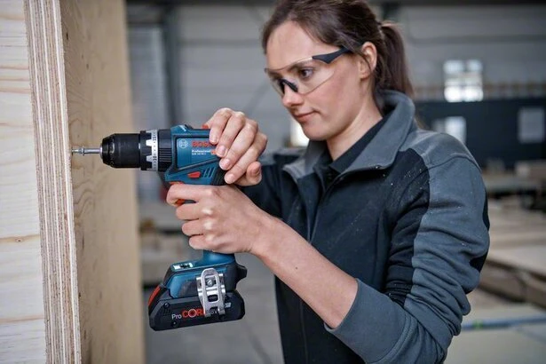 Bosch GSB 18V-90 C be akumuliatoriaus ir kroviklio, dėžutė