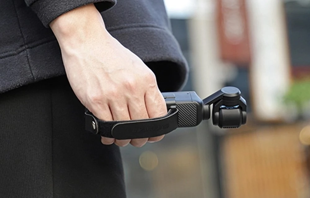 Rankinė juosta ir rankena Sunnylife, skirta DJI OSMO Pocket 3