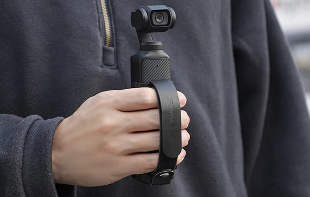 Rankinė juosta ir rankena Sunnylife, skirta DJI OSMO Pocket 3