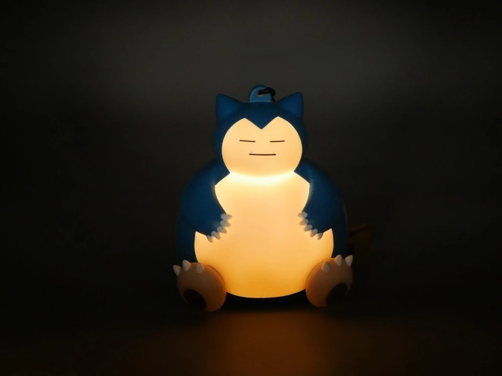 TEKNOFUN TF POKEMON ŠVIEČIANTI FIGŪRĖLĖ SU RANKOS DIRŽELIU - SNORLAX 9 CM