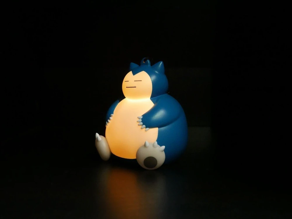 TEKNOFUN TF POKEMON ŠVIEČIANTI FIGŪRĖLĖ SU RANKOS DIRŽELIU - SNORLAX 9 CM
