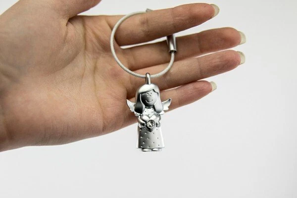 Troika Pakabutis Valerie, anioł Swarovski, metal, sidabrinė (TRKYC35/MA)