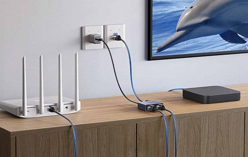 Ugreen Tinklo daliklis ekranuotas RJ45 -> 2xRJ45 (8P8C) Gigabit, pilkas