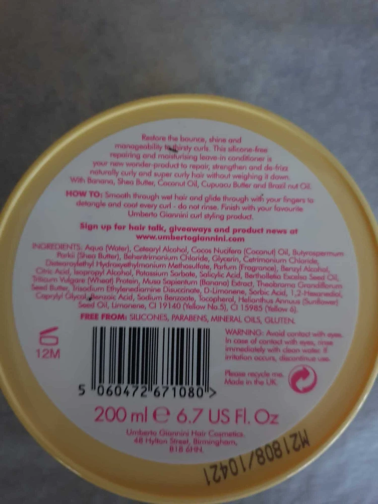 Umberto Giannini Banana Butter plaukų kondicionierius, nenuplaunamas, atkuriantis ir pašalinantis garbanavimą, 200 ml