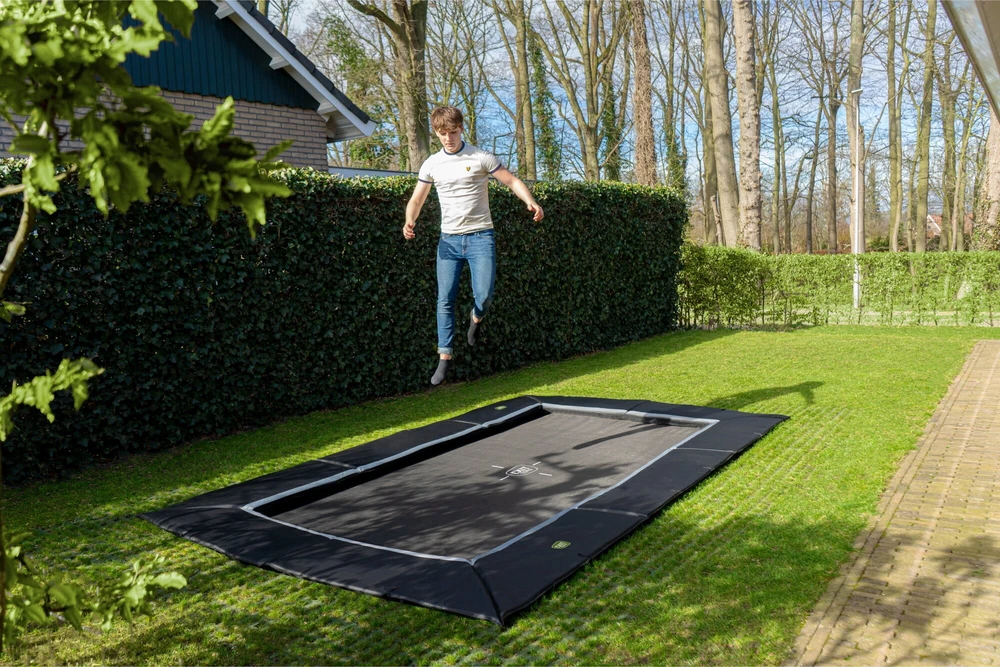 EXIT Dynamic įleidžiamas batutas 244x427 cm su Freezone apsauginėmis plytelėmis, juodas