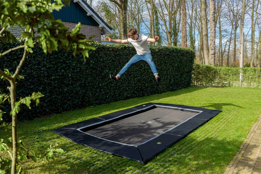 EXIT Dynamic įleidžiamas batutas 244x427 cm su Freezone apsauginėmis plytelėmis, juodas