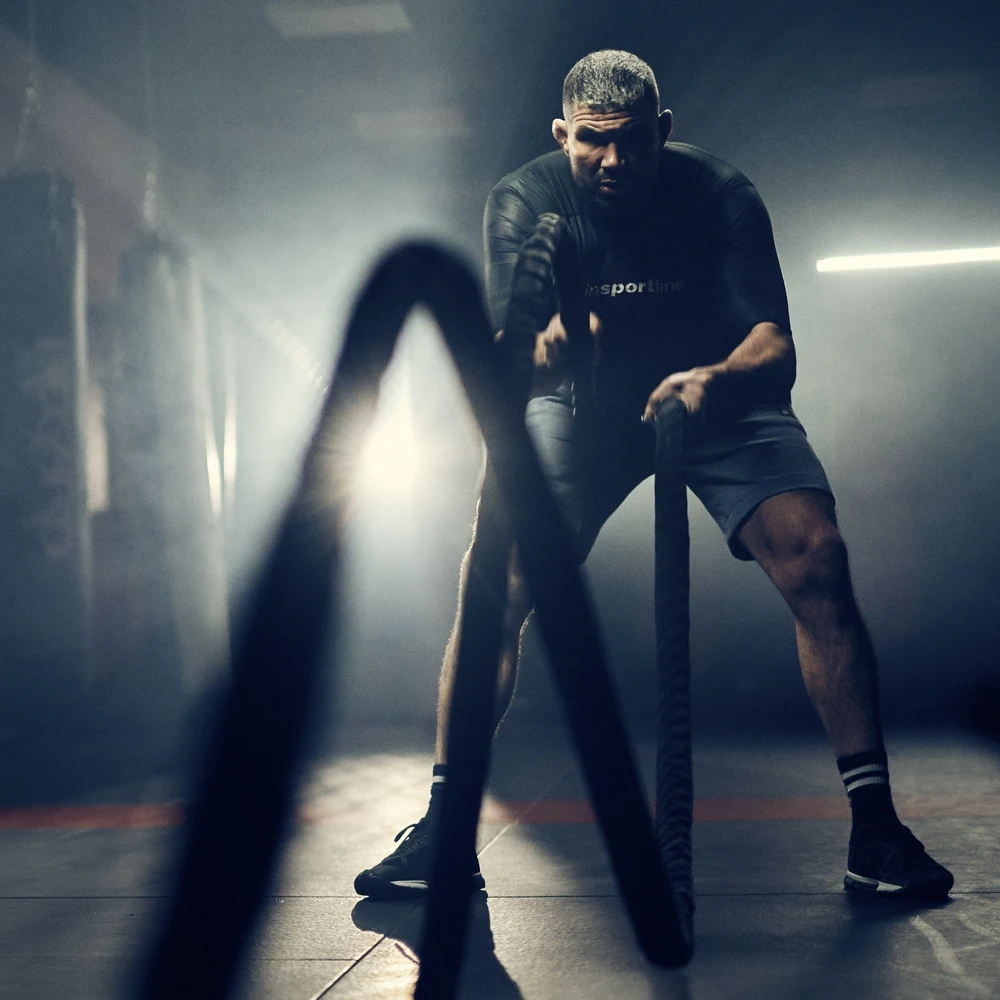 Jėgos-kovos virvė su nailonine apsauga inSPORTline Waverope 15m 50mm 21,8kg