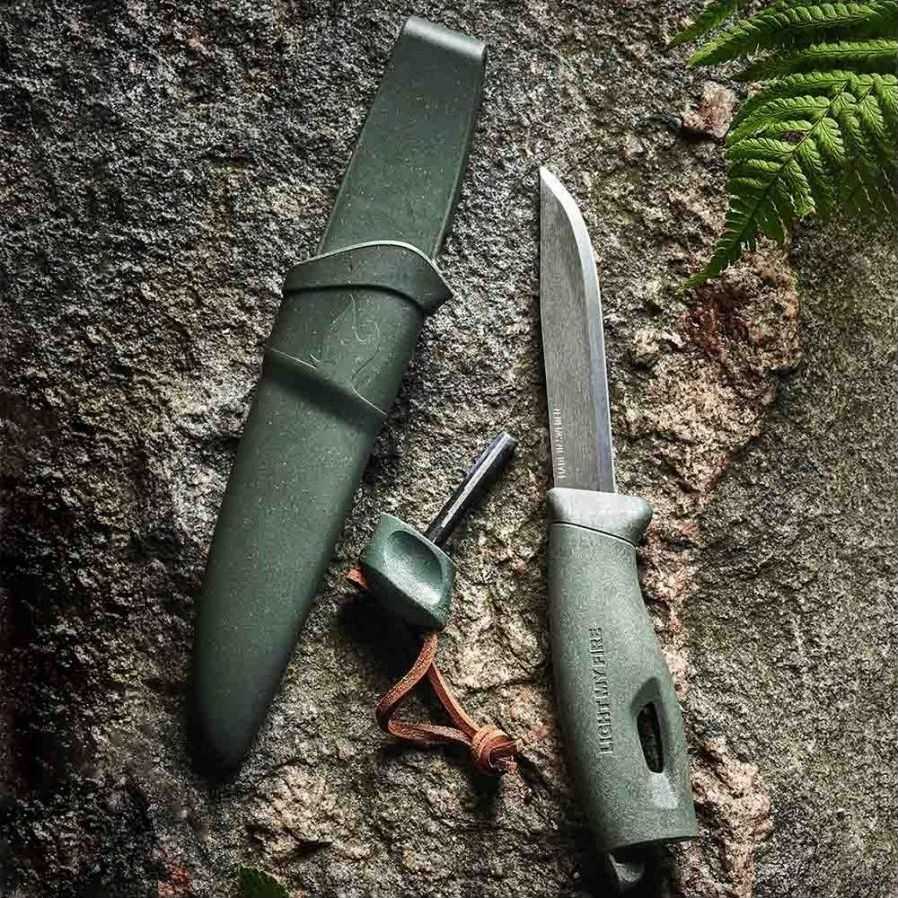 Carruzzo Morakniv "Light My Fire FireKnife" žalios spalvos peilis su akmenukais
