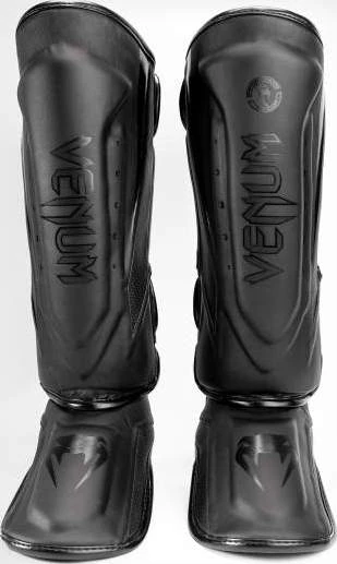 Venum Elite Evo blauzdų apsaugos, juodos/juodos