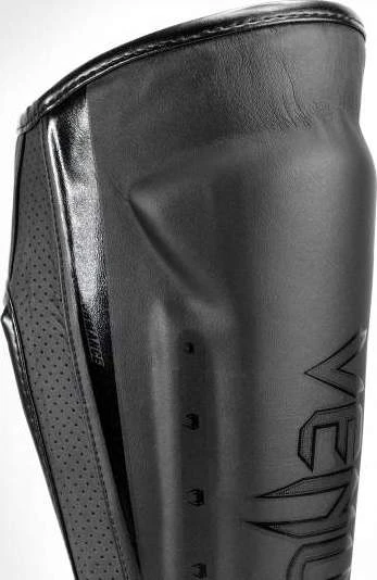 Venum Elite Evo blauzdų apsaugos, juodos/juodos