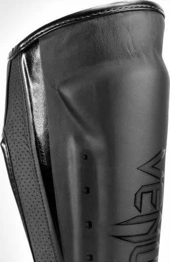 Venum Elite Evo blauzdų apsaugos, juodos/juodos