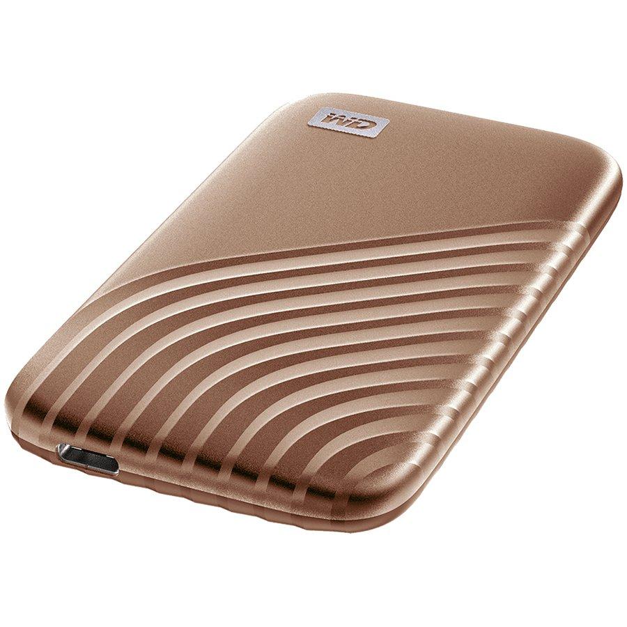 Kietasis diskas Western Digital „Sandisk WD 1TB My Passport SSD“ – nešiojamas SSD diskas, kurio skaitymo ir įrašymo greitis – 1050 MB/s, o įrašymo – 1000 MB/s, USB 3.2 Gen 2 – auksinis, EAN: 619659183981