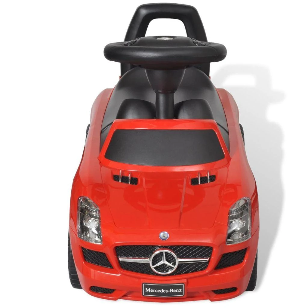 Kojomis varomas vaikiškas automobilis, raudonos spalvos