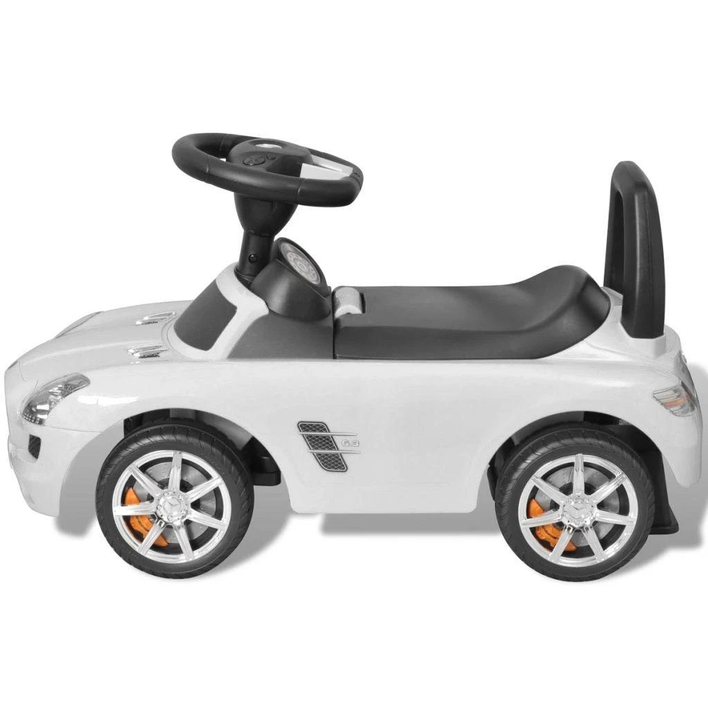 Kojomis varomas vaikiškas automobilis, baltos spalvos