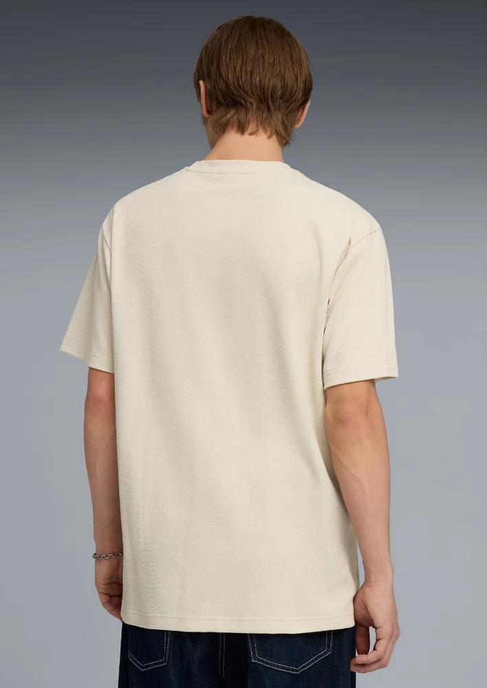 Puma Marškinėliai Vyrams Ess Elevated Relaxed Tee rusvai gelsvas 692018 87