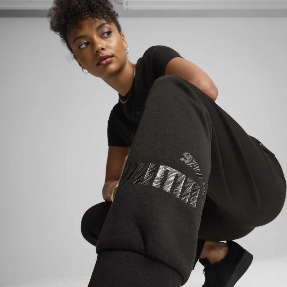 Puma Sportinės Kelnės Moterims Ess+ Animal Pants Fl Juodas 681496 01