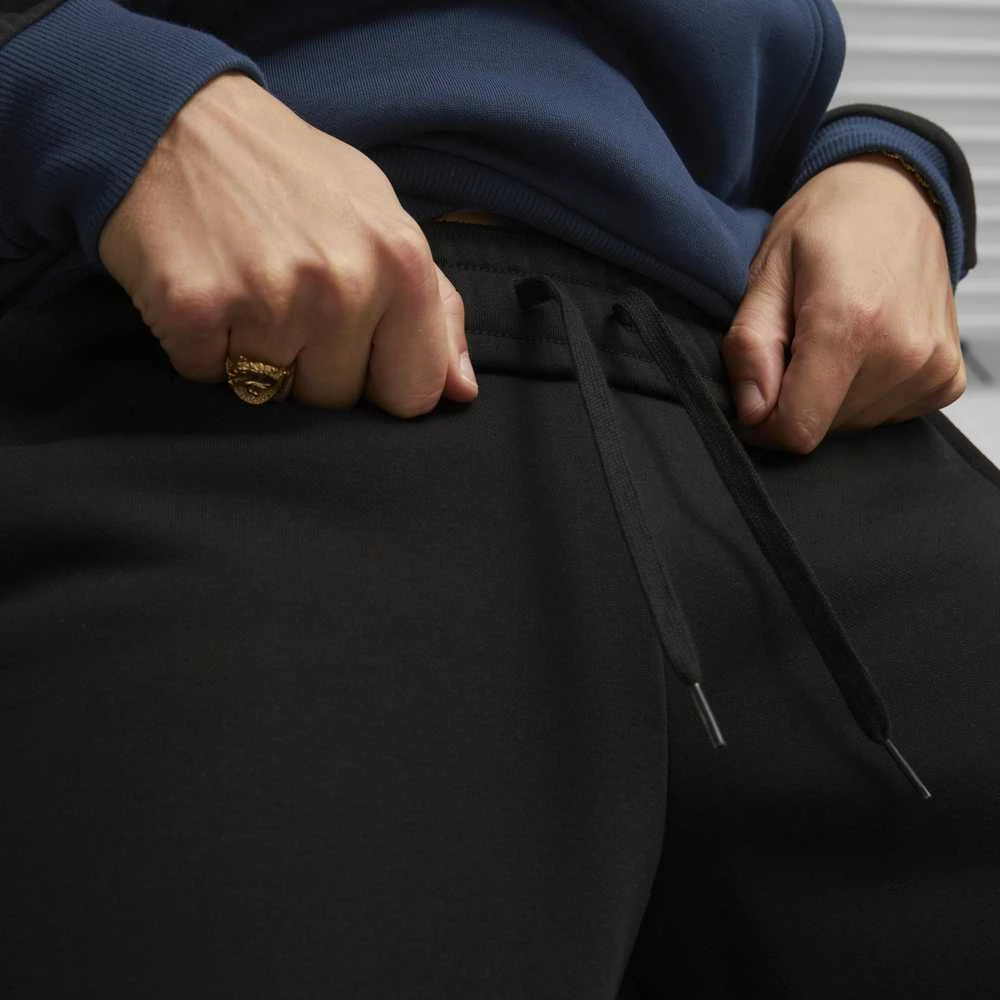 Puma Sportinės Kelnės Vyrams Ess+ Block Sweatpants Juodas Mėlyna Oranžinis 849037 71