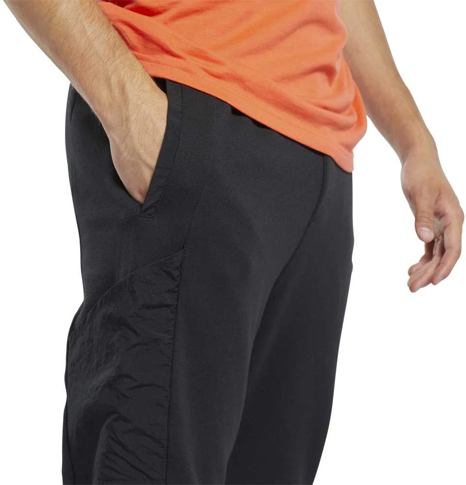 Reebok Kelnės TS Knit - Woven Jogge Juodas FJ4608
