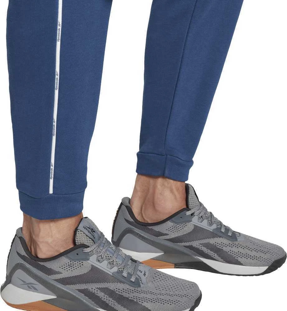 Reebok Kelnės Vyrams Wor Piping Jogger Mėlyna HA1071