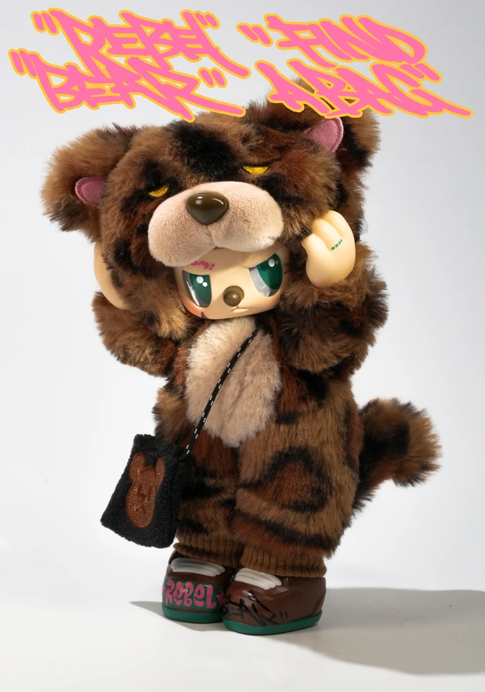 REBEL BEAR Spalvinga lėlė, 18 cm aprašymas - Prekės nuotrauka