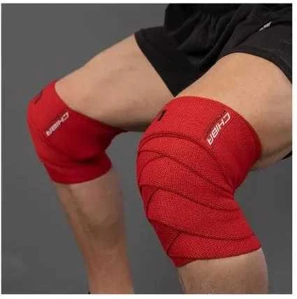 Chiba 44486 Strongman Knee Wrap (kelių apsaugos) (Raudona spalva)