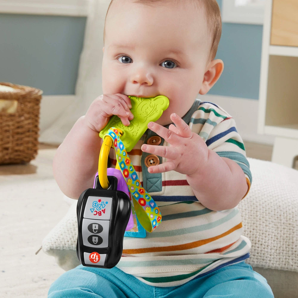 Mattel FISHER-PRICE LAUGH AND LEARN žaisliniai automobilio rakteliai (HVH43)