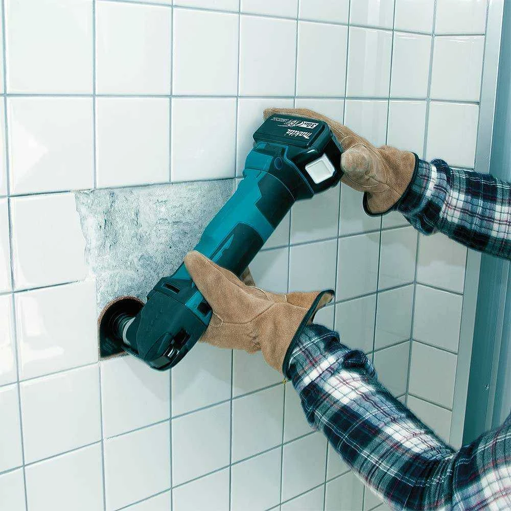 Makita DTM51Z Akumuliatorinis universalus švytuoklinis įrankis 18V 6000-20000 judesiai per min, amplitudė 3,2°; Be akumuliatorių ir kroviklio!