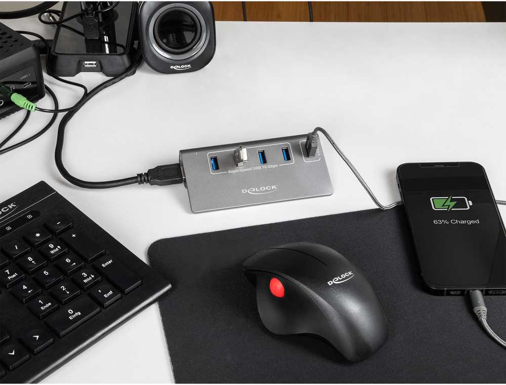 USB ŠAKOTUVAS Delock DeLOCK USB 10 Gbps šakotuvas su 4 USB A tipo prievadais + 1 greito įkrovimo prievadu, USB šakotuvas (pilkas, su maitinimo šaltiniu)