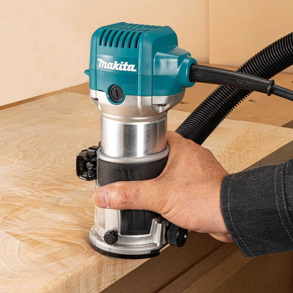 Makita RT0702CX2J Freza 710W 6- 8mm, 10.000 - 34.000 r/min 1,8kg + Priedai