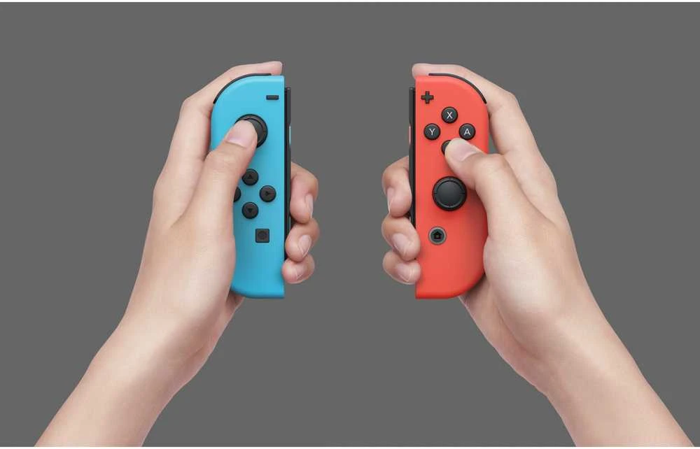 Nintendo Switch OLED konsolė (su Neon Raudona ir Neon Mėlyna Joy-Con)