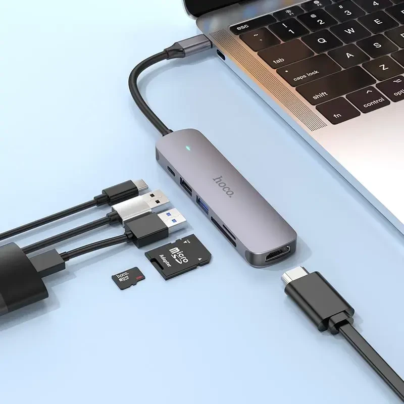 Adapteris Hoco HB28 Type-C daugiafunkcis keitiklis HDMI+USB3.0+USB2.0+SD+TF+PD pilkas