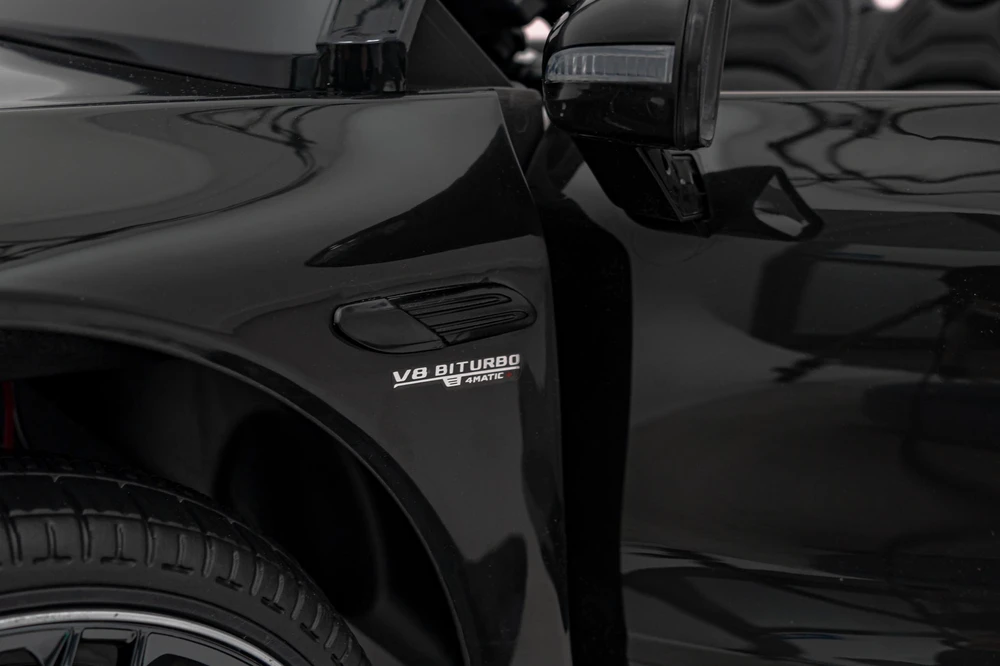 Vaikiškas elektrinis Mercedes Benz AMG SL63 su LED šviesomis ir muzikos funkcija