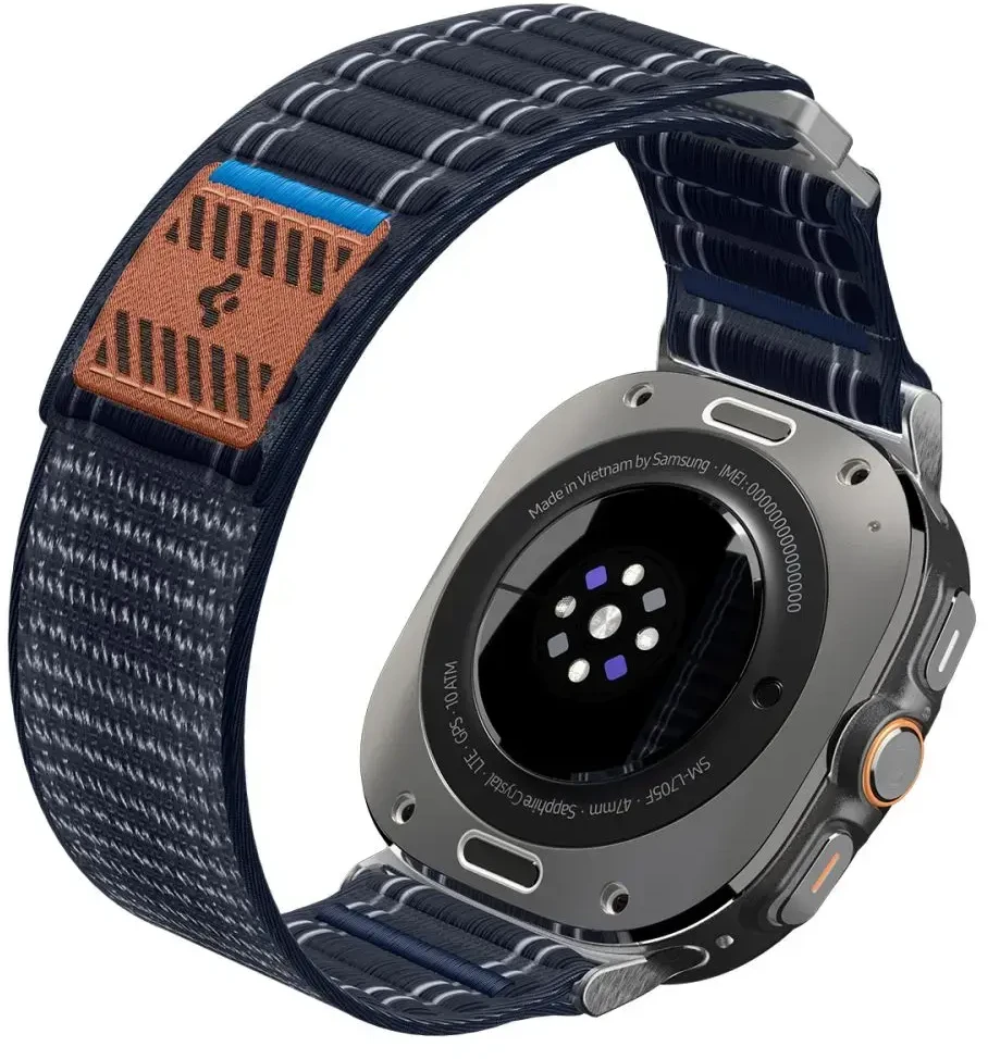 „Spigen“ medžiaginis dirželis (su lipdukais), tamsiai mėlynas – „Samsung Galaxy Watch Ultra 47mm“