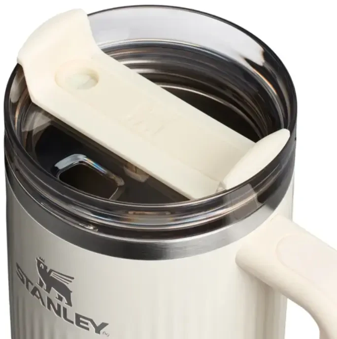 Stanley Thermos mug with straw The Quencher H2.0 Fluted Tumbler 1.18L in glossy cream color
